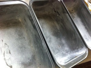 Greased and floured loaf pans